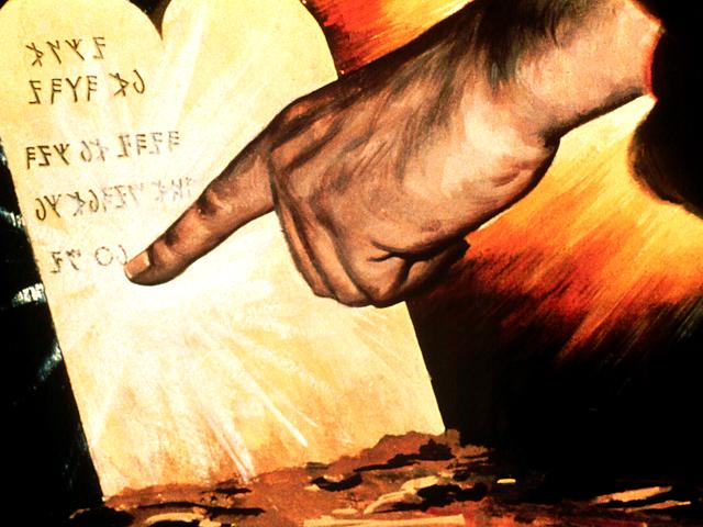 Gott schreibt die 10 Gebote mit seinem Finger